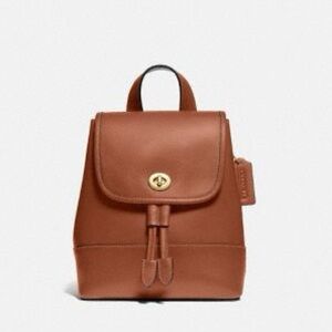 Coach turnlock backpack in caramel